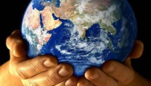Hands holding a globe