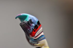 Detail of a brush tip with colour paint